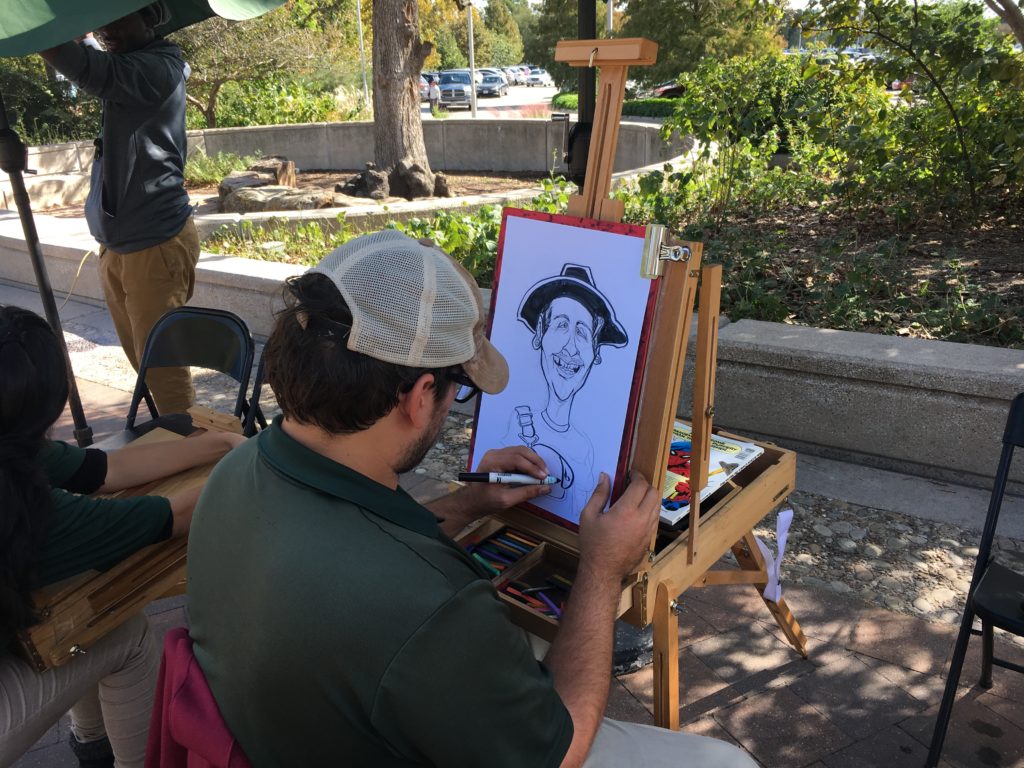 Artist Bryan Barney draws portrait Hermann Park